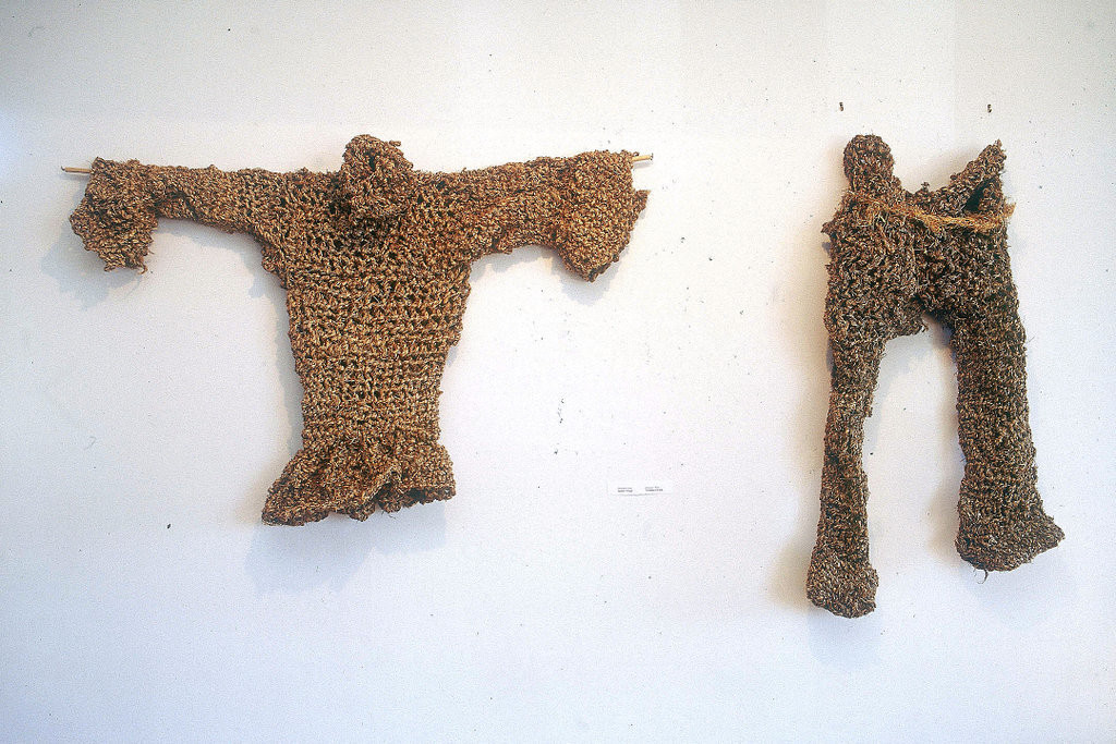 A jacket and a pair of trousers made of woven grass