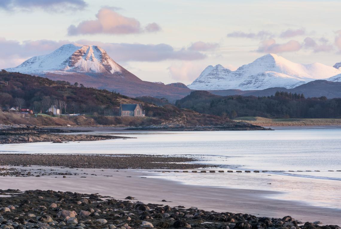 Gairloch beach with Wester Ross hills in the background. (Credit: VisitScotland/ Kenny Lam)