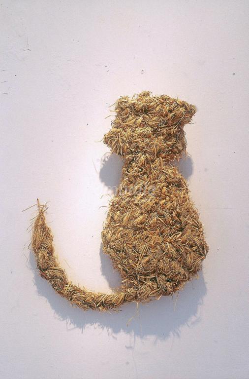 A cat made of woven grass