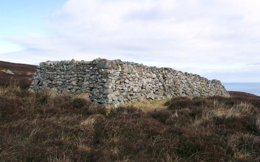 A photograph of a stone sheepfold at Badstor, Sutherland.