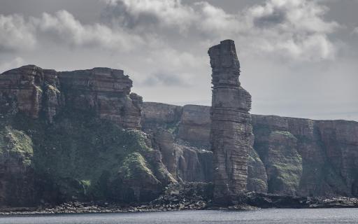 Old Man of Hoy and sea cliffs.