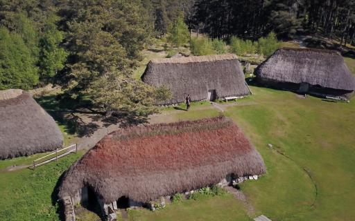 View of four traditional structures at the Folk museum.